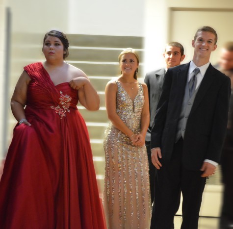 Seniors Ciara Wiegers, Casey Allen, Chase Williams, and Luke Monsees, all get ready to be introduced for homecoming candidates.