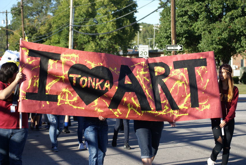 The Art club walking in the Homecoming parade on Oct. 9