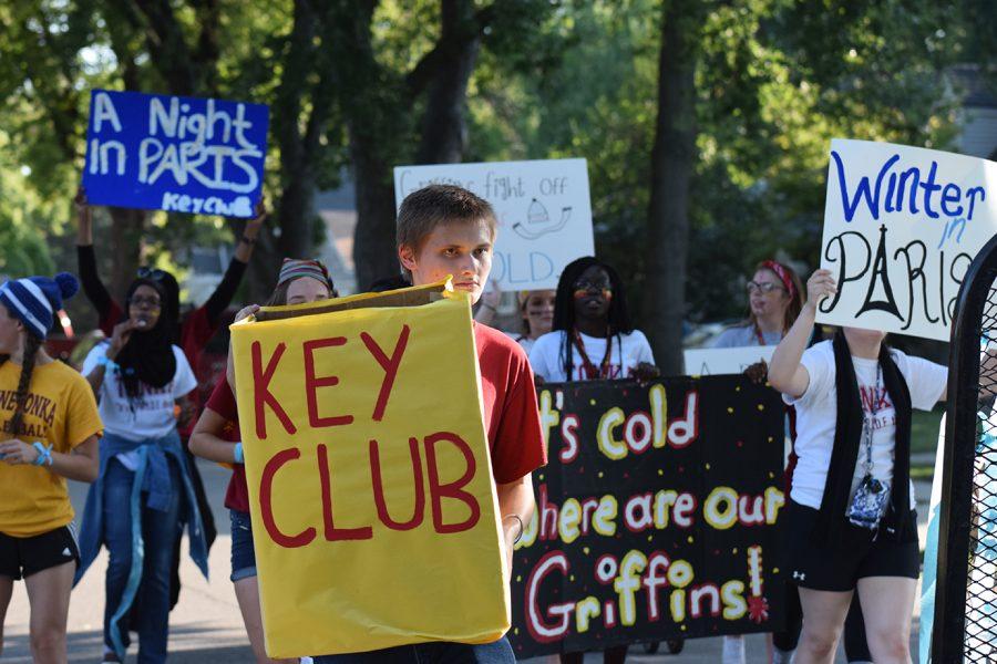 Junior Jerry Keeney walking in the homecoming parade with Key Club on Sept. 23.