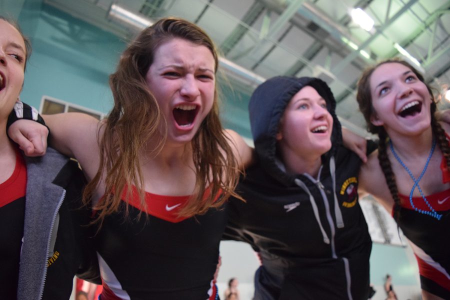 Sophomore Makayla Cambiano chants in the team huddle before prelims on Friday Feb. 3.