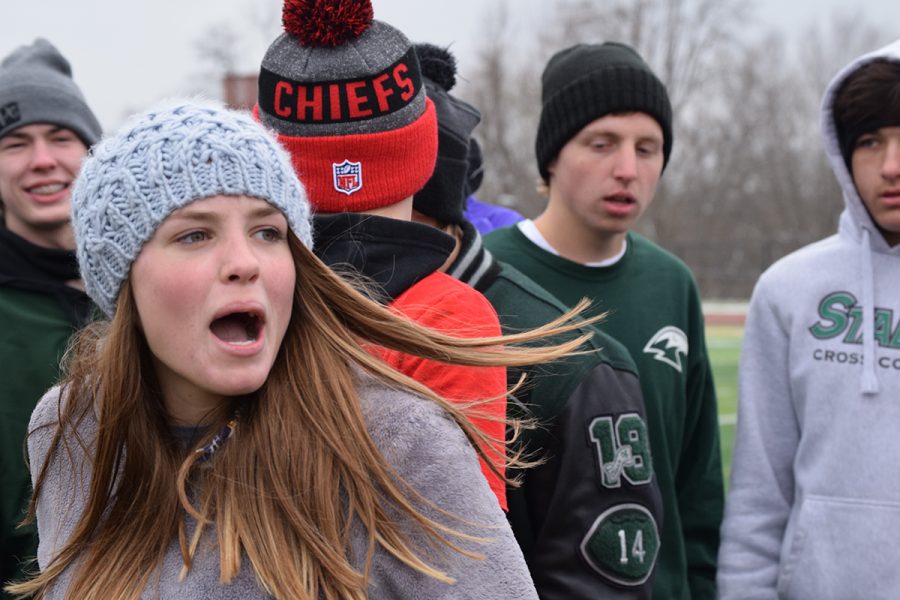 Senior Cayla Adamson yells at the teams as she tells them how the tournament brackets will work. Adamson organized the event and is the leader of the Ultimate Frisbee Relay for Life Team.