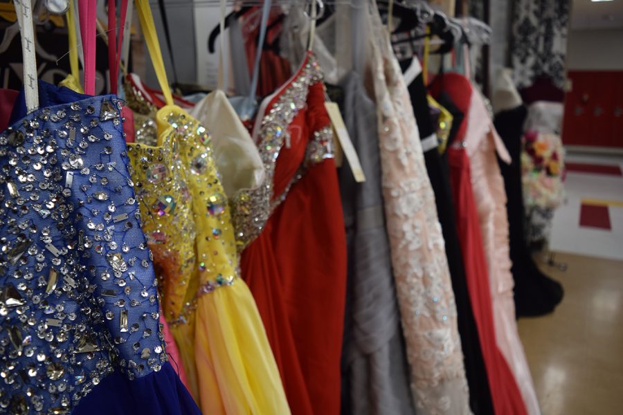 Prom dresses are lined up to be tried on at the boutique on Feb. 8.