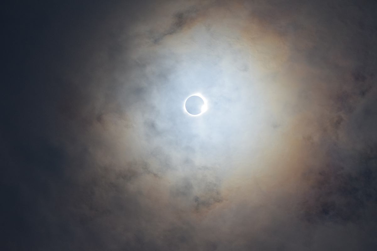 Shortly after totality, the moon begins to move away from the sun