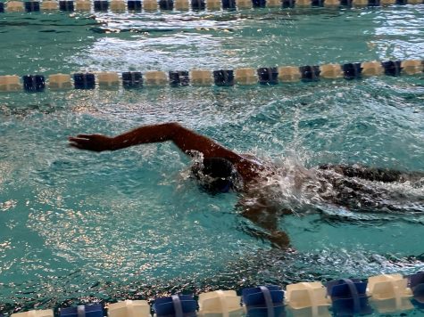 Senior Brennen Johnson Breaks School Swim Records